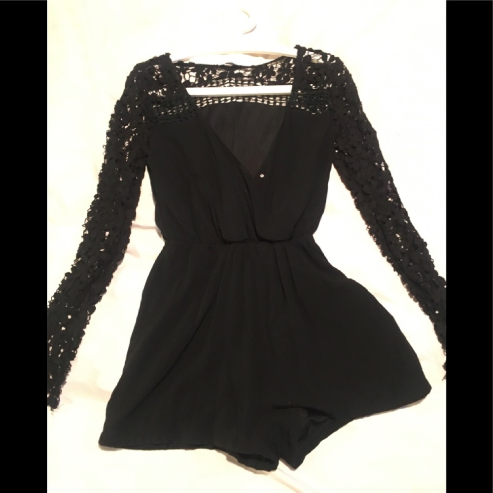 Super cute black romper with lace long sleeves